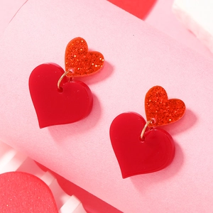 Elegant red double heart acrylic earrings with sparkling glitter finish for party fashion