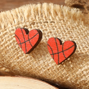 Minimalist heart-shaped wooden earrings with basketball pattern and natural wood grain