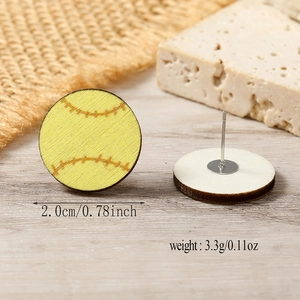 Macro detail of wooden baseball earrings showing 0.78 inch diameter and natural wood back