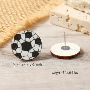 Detail view of wooden football earrings showing 2cm diameter and 3.3g weight specs