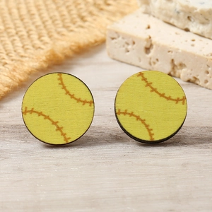 Handcrafted wooden softball stud earrings with realistic yellow stitching on wood surface