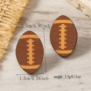Detailed view of wooden American football earrings showing dimensions and natural texture
