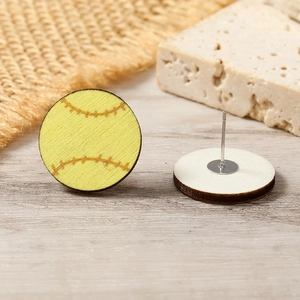Detail of wooden softball studs showing high-definition print and silver metal posts