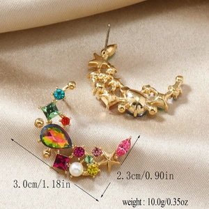 Detailed size view of moon and star earrings with colorful rhinestones and pearl