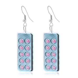 Pink heart capsule tablet acrylic drop earrings in Y2K style with silver metal hooks