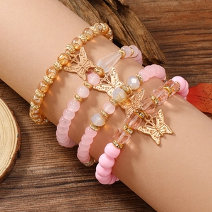 Böhmisches mehrlagiges Perlenarmband-Set mit rosa Kristallen und Gold-Schmetterlingen