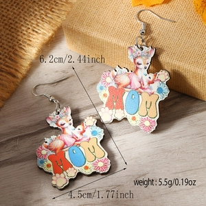 Detail of wooden MOM earrings with colorful deer print on rustic linen gift box