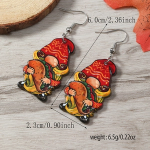Vue détaillée des boucles d'oreilles gnome mexicain avec design taco et tailles