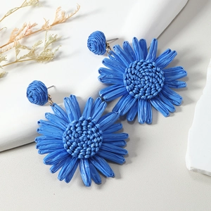 Blue bohemian woven raffia daisy earrings for summer beach vacations and daily wear