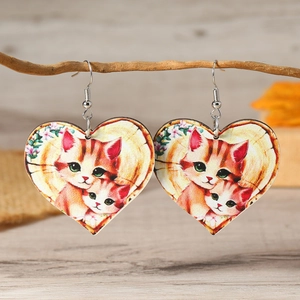 Exaggerated wooden heart earrings with cute ginger cat print and floral details