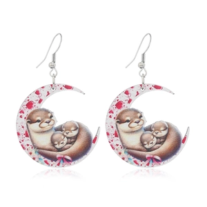 Artistic moon-shaped wooden earrings featuring a cute sea otter family and floral design
