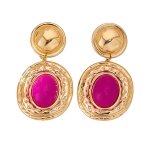 Vintage bohemian gold earrings with large oval fuchsia stone in a textured metal frame