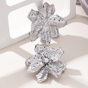 Exaggerated silver flower earrings with pleated texture and pearl center for women