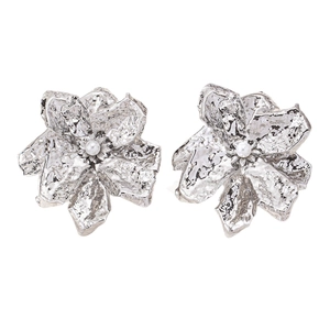 Hammered silver flower stud earrings with central pearl in a modern artistic design