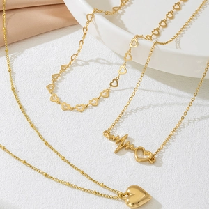 Three-layer gold-plated layered heart pendant necklaces set for elegant women