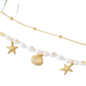 Chaîne de taille bohème double rang avec coquillages naturels et breloques étoile de mer