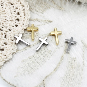 Detailed view of mixed color sun cross spacer beads for DIY jewelry making