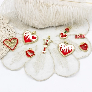 Red and white heart-shaped charms with gold edges and diamonds for DIY jewelry making