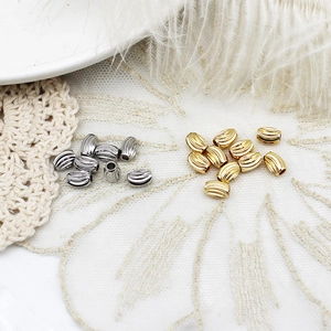 Perles d'espacement en métal rayé or et argent pour création de bijoux DIY et colliers