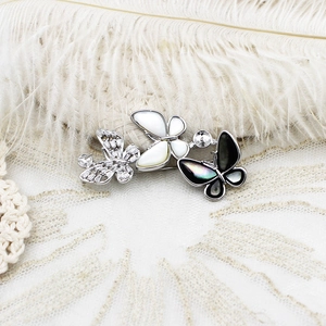 Luxury butterfly brooch with natural mother of pearl and cubic zirconia in silver finish