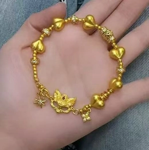 Vergoldetes Perlenarmband aus Messing mit Fuchsmaske, Stern- und Blumenanhängern