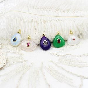 Variety of colorful natural stone geometric pendants with gold trim for DIY jewelry making