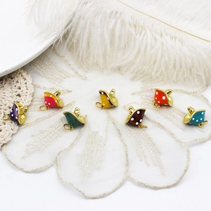 Set of 7 colorful mushroom charms with white polka dots for DIY jewelry making