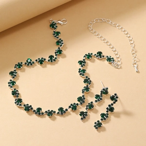 Elegant silver necklace and earring set with round emerald green rhinestones for evening wear
