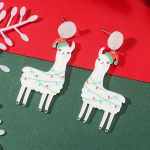 Christmas alpaca dangle earrings with red Santa hat and colorful lights on festive background