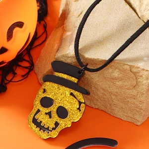 Retro Halloween Totenkopf-Anhänger aus Acryl mit Goldglitzer und schwarzem Hut auf Orange