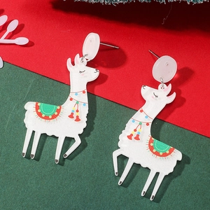 Christmas alpaca earrings with festive hat and colorful tassels on red green background