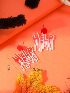 Detail view of bloody HELP sign earrings with size labels 4cm by 3.5cm for Halloween