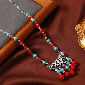 Traditional Chinese vintage fringe necklace with hollow flower pendant and colorful beads
