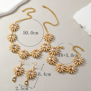 Golden sunflower jewelry set with champagne crystals and pearls for gala dresses
