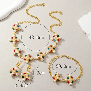 Detail view of colorful rhinestone flower jewelry set with precise size dimensions