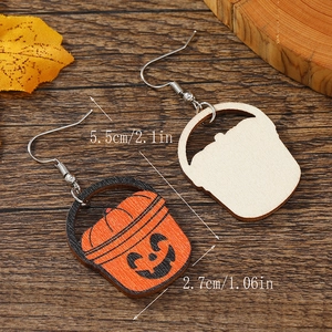 Detail showing wooden Halloween pumpkin bucket earrings with dimensions 5.5cm by 2.7cm