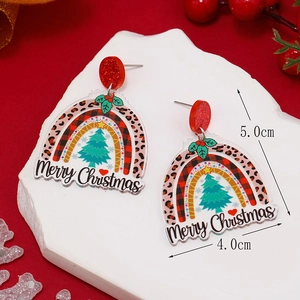 Detail of Christmas tree acrylic earrings with Merry Christmas text and red sequins