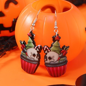 Boucles d'oreilles festives en acrylique avec crâne et sapin sur fond de citrouille