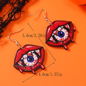 Détail des boucles d'oreilles d'Halloween en forme de bouche et œil avec dimensions
