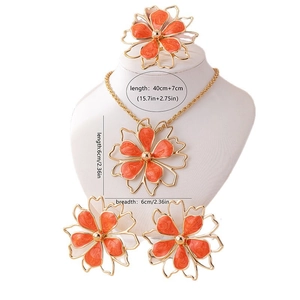 Chic gold-plated jewelry set with orange enamel flower necklace, earrings and ring