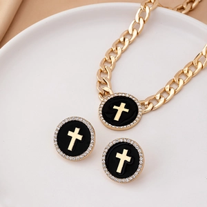 Enamel cross pendant necklace and stud earrings set with sparkling zircon crystals