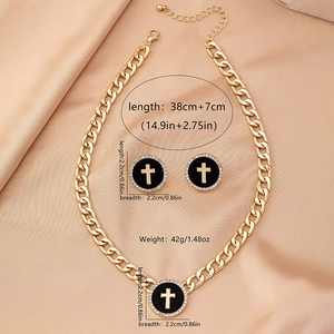 Detailed view of enamel cross jewelry set on satin with size and weight specifications