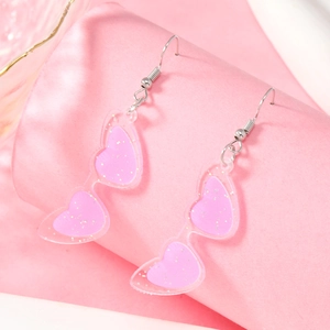 Orecchini a forma di occhiali da sole a cuore rosa glitterato in acrilico lucido