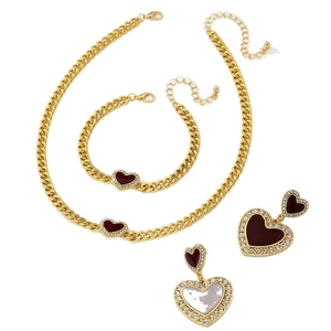Elegant gold heart jewelry set with necklace bracelet and earrings in red enamel