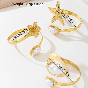 Three-piece gold starfish and flower cuff armlet set with imitation pearls, 8cm diameter