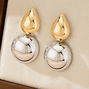 Minimalist geometric round earrings with gold water drop and silver polished metal sphere