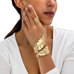 Modern gold irregular textured open cuff bracelet and wide ring set for women