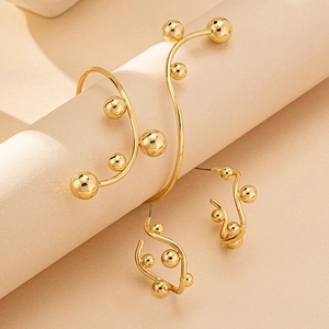 Set orecchini a sfera a C e bracciale dorato dal design in metallo minimalista