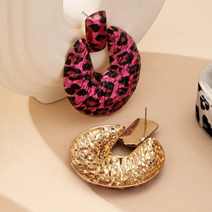Pink leopard print C-shaped oversized earrings with gold hammered metal finish