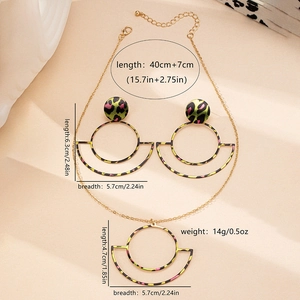 Flat lay of leopard print geometric jewelry set with detailed size dimensions in cm and inches